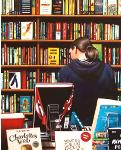 Catalogue- hyperrealism painting by artist Gerard Boersma showing woman behind computer searching books in public library Leeuwarden