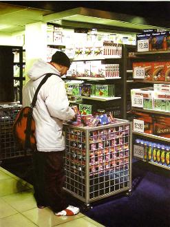 child- hyperrealism acrylic painting by artist painter Gerard Boersma showing man in toys r us store at timessquare in New York