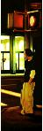 cross roads- hyperrealism acrylic painting by artist painter Gerard Boersma showing a cityscene of a man standing at an intersection with red traffic light at night in New York