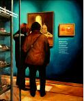 hyperrealism painting Wheelbarrow by Gerard Boersma showing 2 women admiring art by Jopie Huisman 