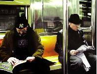Subway- hyperrealism painting by artist Gerard Boersma showing two men riding subway metro in New York