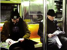 subway- hyperrealism painting by artist Gerard Boersma showing two men riding subway metro in New York