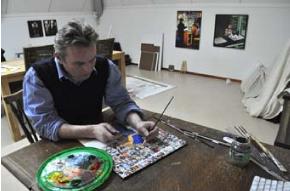 artist gerard boersma in his studio working on painting conqueror