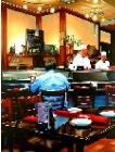 Sushi Bar- hyperrealism acrylic painting by artist painter Gerard Boersma showing a man in a sushi bar