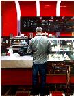 Va Bene- hyperrealism acrylic painting by artist painter Gerard Boersma showing a man in coffee bar Va Bene, Las Vegas